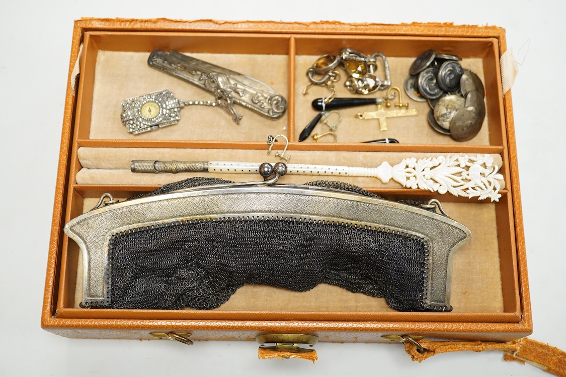 A quantity of assorted antique and later costume jewellery to include a silver and Marcasite ladies fob watch, a collection of cufflinks, brooches and a pair of drop earrings with screw backs